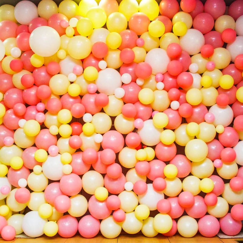 Colorful Balloons Arranged in a Pattern To Create A Balloon Wall